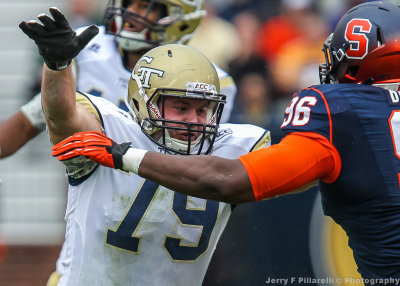 Georgia Tech OL Chase Roberts hold off a Syracuse defender