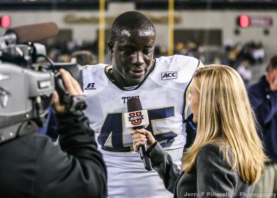 Yellow Jackets DE Attaochu is interviewed by ESPN after the game