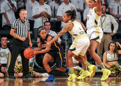 Georgia Tech G Maye defends Coppin State G Griffin along the baseline