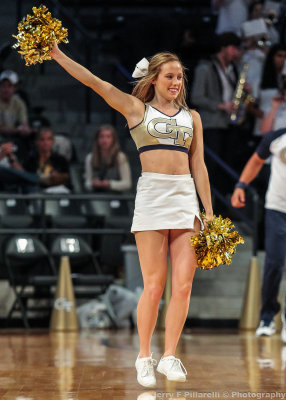 Georgia Tech Cheerleader performs during a break in the action