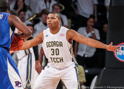 Georgia Tech G Corey Heyward fronts a Presbyterian ball handler