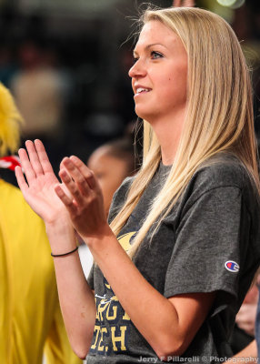 Georgia Tech Yellow Jackets Fan applauds her team