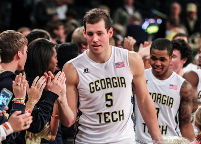 Georgia Tech players thank the fans led by C Miller