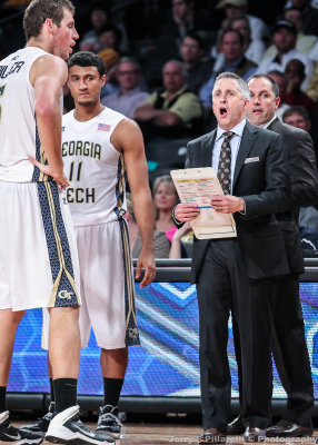 Georgia Tech Head Coach Brian Gregory directs the team during a timeout