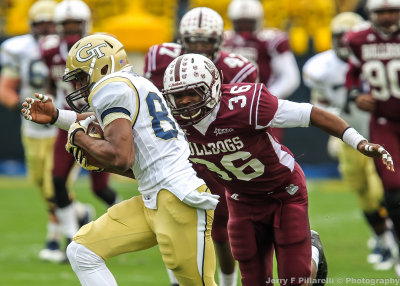 GT WR Michael Summers makes a catch and is brought down by A&M DB Chris Ervin