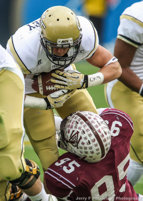 GT RB Zach Laskey tries to get by AAMU DL Reginald Bailey
