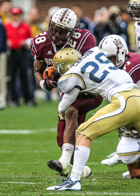 Yellow Jackets DB Coray Carlson stops Bulldogs RB Scott