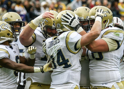 …Tech BB Connors celebrates the touchdown with his teammates