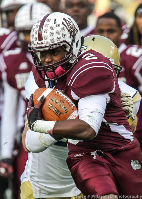 AAMU WR Terrance Pride tries to advance after a catch