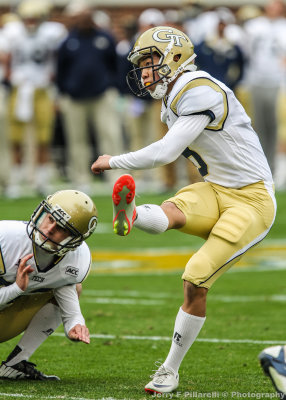 Yellow Jackets K Andrew Chau follows through on the extra point attempt