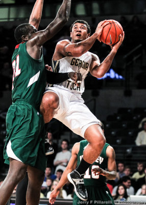 Georgia Tech G Chris Bolden goes baseline on MVS C Julius Francis…