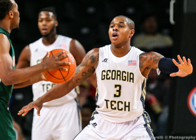 Jackets F Georges-Hunt squares up on a Delta Devils ball handler