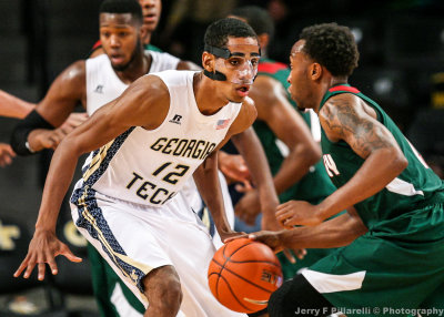 Yellow Jackets F Stephens stays in front of a Delta Devils offensive player