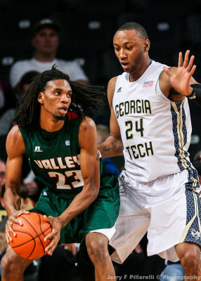Jackets F Holsey defends Delta Devils F Currington