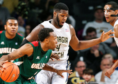 Yellow Jackets F Carter stays in front of MVS G D’Angelo Priar