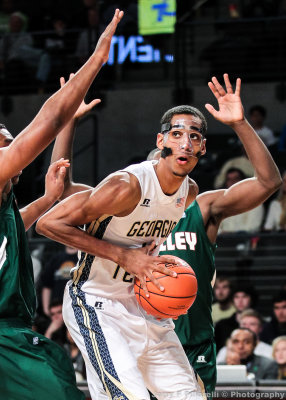 Jackets F Stephens looks to pass out of a trap by Delta Devils defenders