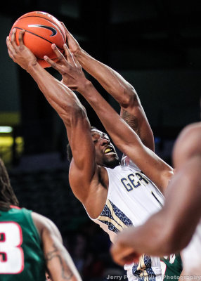 Georgia Tech G Stacey Poole grabs a tough rebound