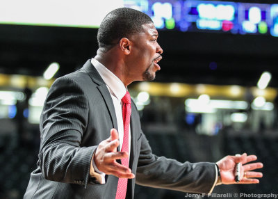 Mississippi Valley State Head Coach Chico Potts instructs his team from the bench