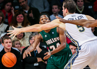 Delta Devils G Anthony McDonald sends an inbounds pass under the arm of GT C Miller