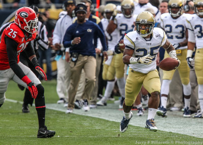 Georgia Tech AB Godhigh runs down the sidelines