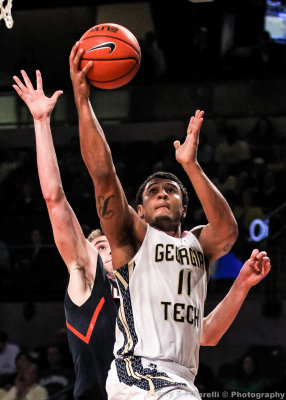Yellow Jackets G Bolden glides to the basket past a Fighting Illini defender
