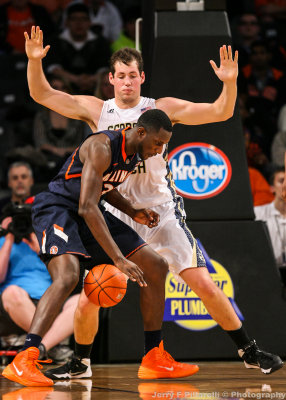 Georgia Tech C Miller stands his ground under the basket on Illinois C Egwu