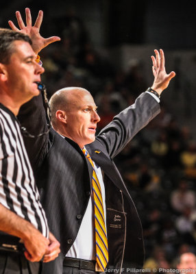 Illinois Fighting Illini Head Coach John Groce signals his team during the game