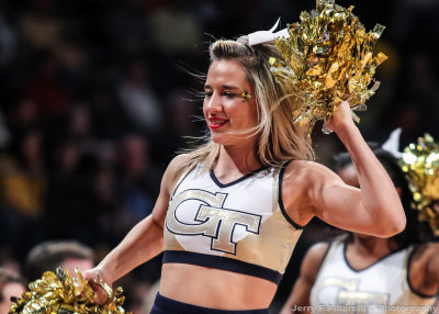 Georgia Tech Yellow Jackets cheerleader during a break in the action