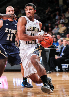 Georgia Tech G Bolden gets by East Tennessee State defenders