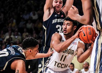 Yellow Jackets G Chris Bolden fights for room in the lane