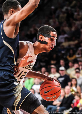 Georgia Tech F Stevens drives around a Notre Dame defender