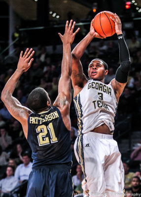 Yellow Jackets F Marcus Georges-Hunt shoots over Panthers F Lamar Patterson