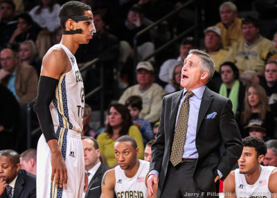 Georgia Tech Yellow Jackets Head Coach Brian Gregory instructs F Stephens as he comes to the bench