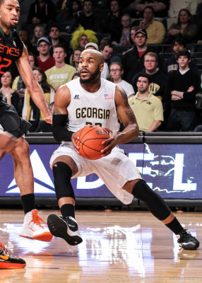 Georgia Tech G Golden drives the baseline