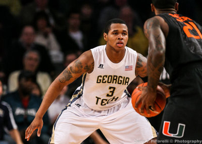 Yellow Jackets F Georges-Hunt defends Hurricanes F Swoope