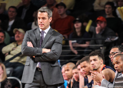 Virginia Cavaliers Head Coach Tony Bennett watches the action from in front of the bench