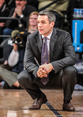 Virginia Cavaliers Head Coach Tony Bennett watches his team from the sideline