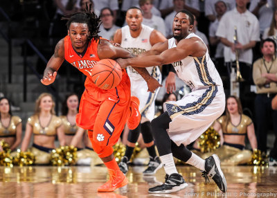 Georgia Tech G Stacey Poole Jr. chases the loose ball and Clemson G Rod Hall