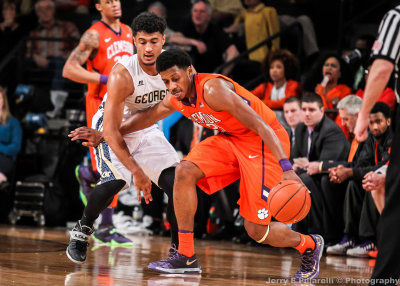 Yellow Jackets G Bolden knocks the ball loose from Tigers G Harrison