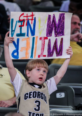 Yellow Jackets Fan does his best to support Senior Daniel Miller