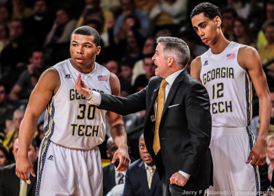 Georgia Tech Yellow Jackets Head Coach Brian Gregory gives instructions to his players