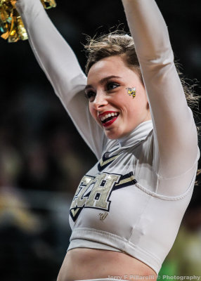 Georgia Tech Cheerleader works the crowd during a timeout