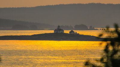 Egg Rock Lighthouse basks in the early morning sunlight in Acadia National Park