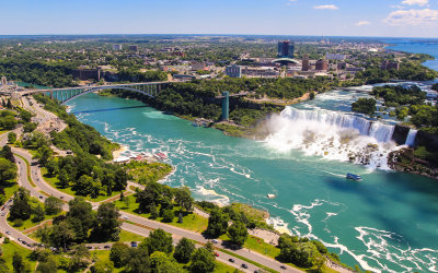 View of Rainbow Bridge and the US Falls from Skylon Tower in Niagara Falls Canada