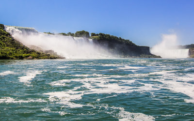 The US (left) and Horseshoe Falls (right) as the boat moves away from the dock