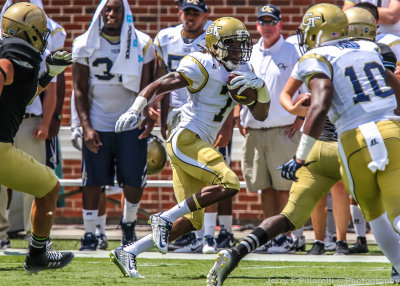 Jackets A-back BJ Bostic Sprints down the sidelines