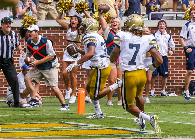 Jackets A-back Hill scores the go-ahead touchdown with 23 seconds left in the game