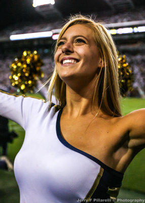 Georgia Tech Dance Team member performs on the sidelines
