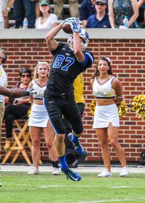 Blue Devils WR Max McCaffery halls in a pass along the sidelines