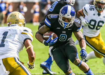 Blue Devils RB Snead cuts in front of Jackets S Isaiah Johnson